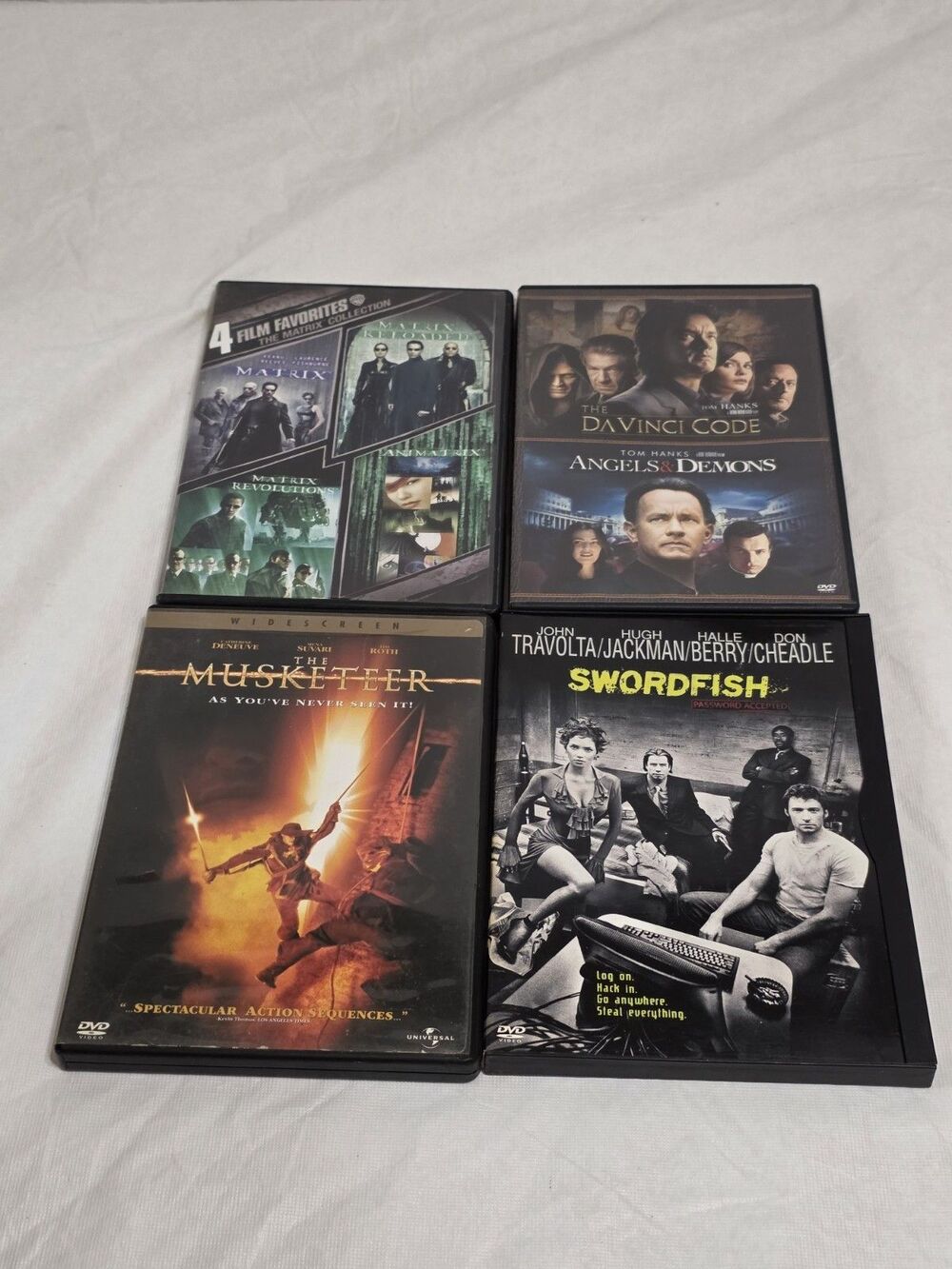 The Musketeer, The Davinci Code/ Angels & Demons, Matrix, Swordfish 4 DVDs Lot
